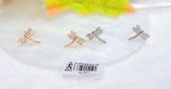 Shiny earrings shaped like dragonflies