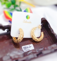 Gold style earring