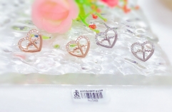 Heart hollow artificial jewel stud earrings