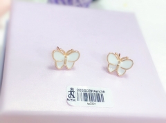 White latex butterfly style earrings