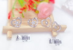 Hollow style silver earring