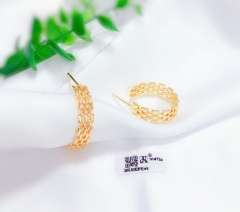 braided style gold earrings