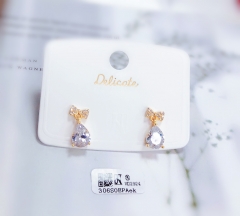 Bow/tear drop gold pendant earrings