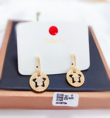 Hollow style gold earrings