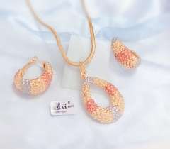 Water droplet shaped hollowed out necklace earrings