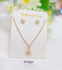 Irregular gold earrings and necklace