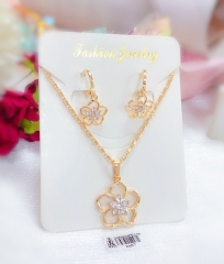 Hollow five-petal gold earrings and necklace