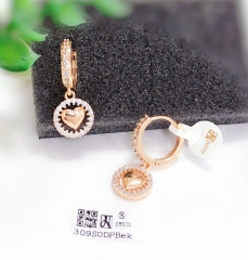 Hollow with polished heart Gold earrings