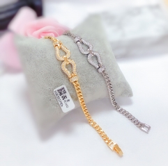 Irregular style gold/silver bracelet