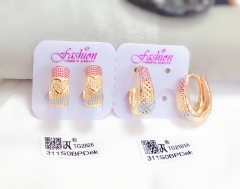 Heart pattern style gold earrings