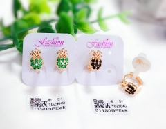 Diamond-encrusted pineapple-shaped gold earrings