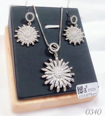 Sunflower gem style/gold earrings and necklace