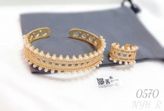 Gold-tone pearl bangle ring set