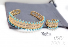 Gold-tone blue pearl bangle ring set