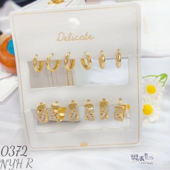 Glossy gold color earring