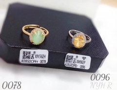 Light green/orange color gem ring