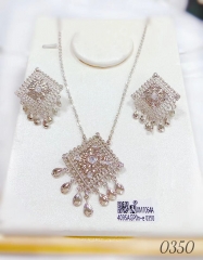 Beautiful and dazzling silver/gold earrings and necklace