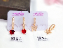 Red gem/butterfly pendant earring