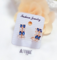 Vertical arrangement of blue and white zircon exquisite earrings