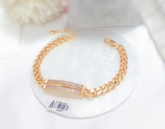 Simple gold/silver bracelet with artificial gemstones