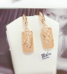 Glossy gold shiny style earring