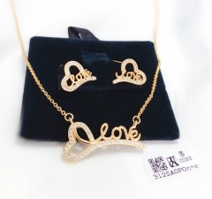 Love heart style gold/silver earrings and necklace