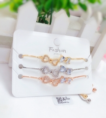 Artificial gemstone bow style bangle set