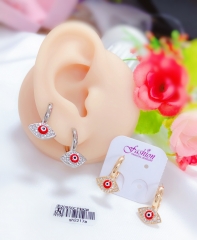 Red eye gem style single earring