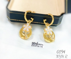 Flower style gold pendant earring