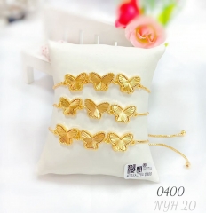 Simple butterfly gold bangle set