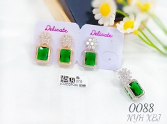 Flower style green gem earring