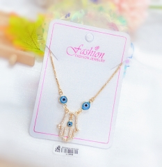 Hand style blue eye necklace