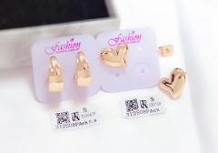 Irregular style glossy rose gold color earring