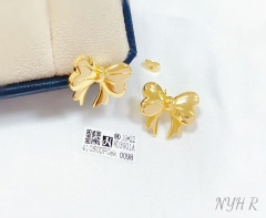 Glossy bow model shiny stud earring