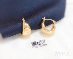 Glossy hollow gold color earring