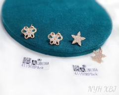 Butterfly/star style fine stud earring