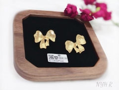 Bow model polishing stud earring