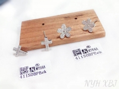 Cross/flower model shiny stud earring