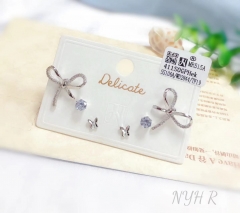 Bow/butterfly model exquisite silver/gold stud earring