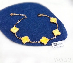 Yellow four leaf clover style bracelet