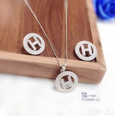 Letter H is contained in a circle model silver/gold earring necklace set