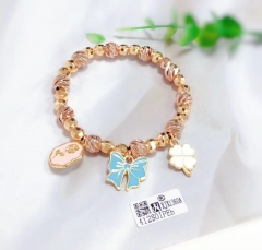 Rose/bow/four leaf clover pendant beads bracelet