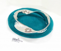 Twist curl style bright silver/gold bangle