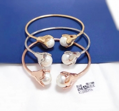 Trendy double pearl model bangle set