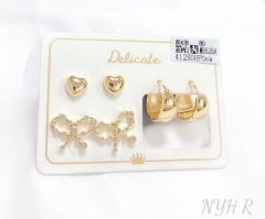 Heart/bow model bright earring