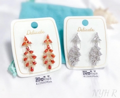 Orange red/white crystal pendant earrings