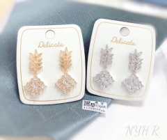 Square shaped dazzling pendant earrings