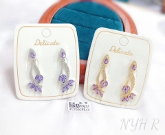 Purple crystal pendant earrings