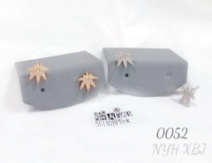 Maple leaf-shaped stud earrings