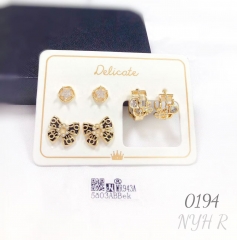 New hollow five-pointed star black bow pearl earrings